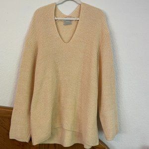 Urban Outfitters Long sweater in a buttery yellow